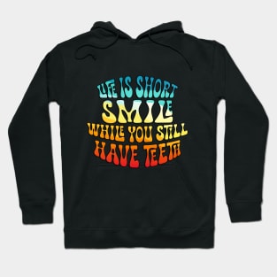 Embrace the Joy: 'Life is Short, Smile While You Still Have Teeth' Graphic Collection Hoodie